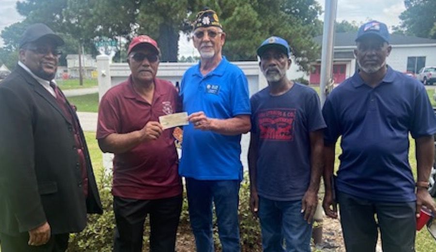 American Legion Post 103 gives to Men of FIC book bag drive